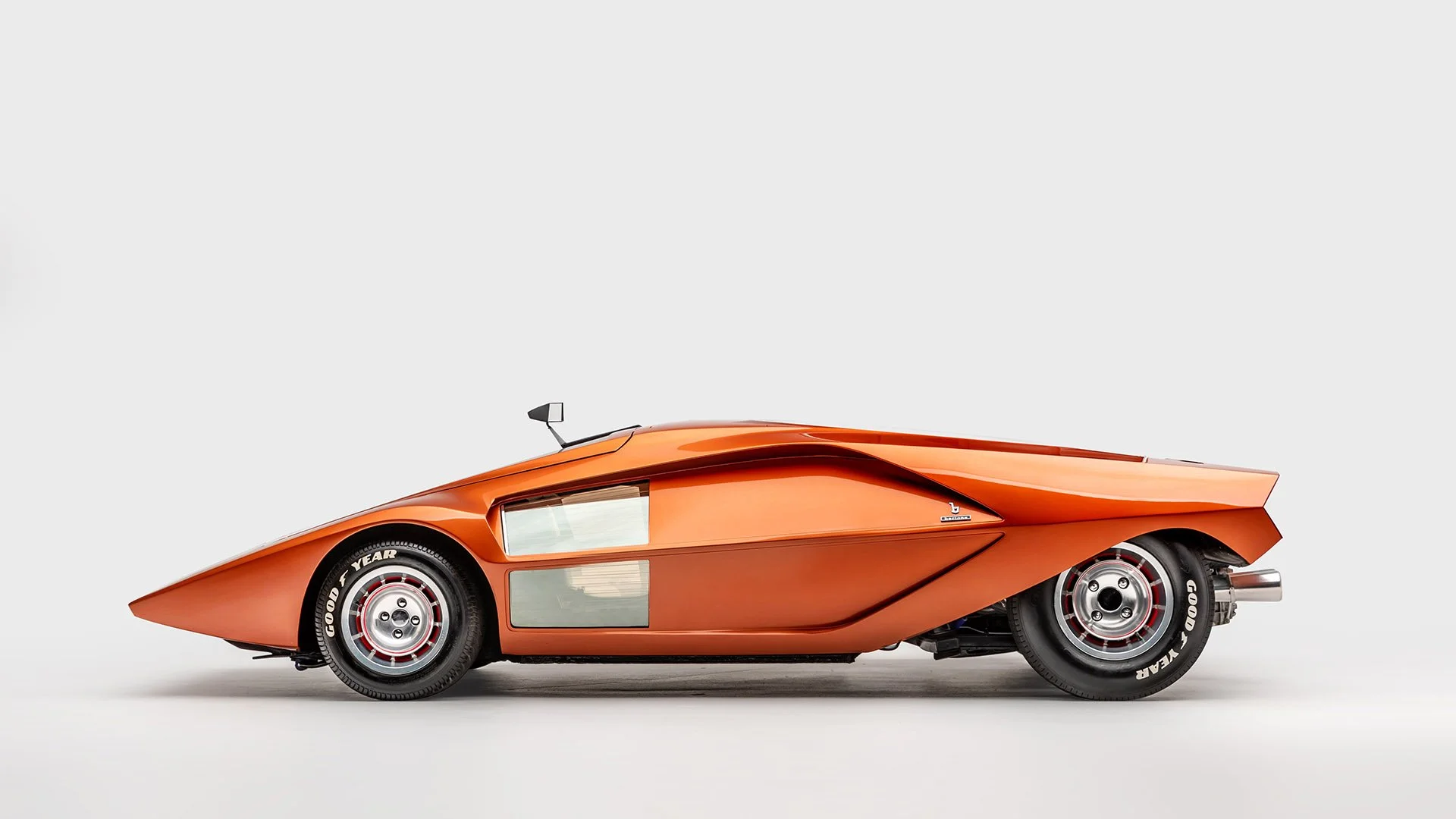 Lancia Stratos HF Zero right side profile in metallic orange (Credit: Petersen Museum)